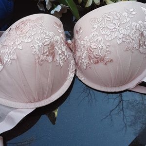A pink padded push bra